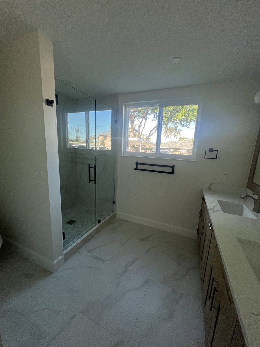 marble tile walk-in shower with window bathroom remodel - optimized