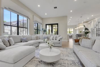 A open-concept living room with lots of natural light in a whole home remodel.