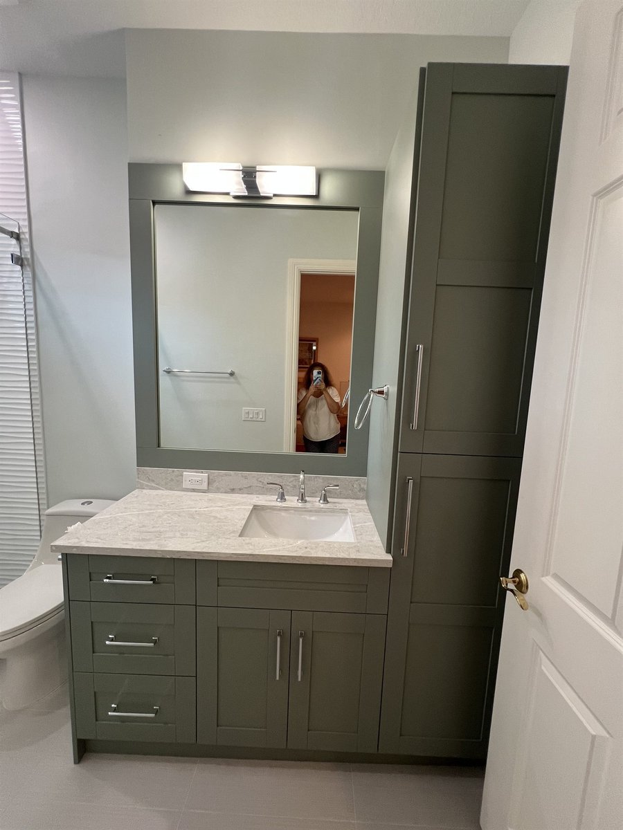 green vanity with tall linen tower cabinet bathroom remodel - optimized