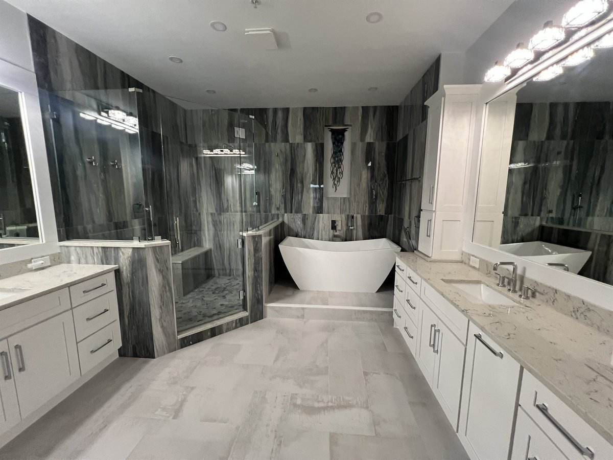 master bath with freestanding tub and double white vanity bathroom remodel - optimized