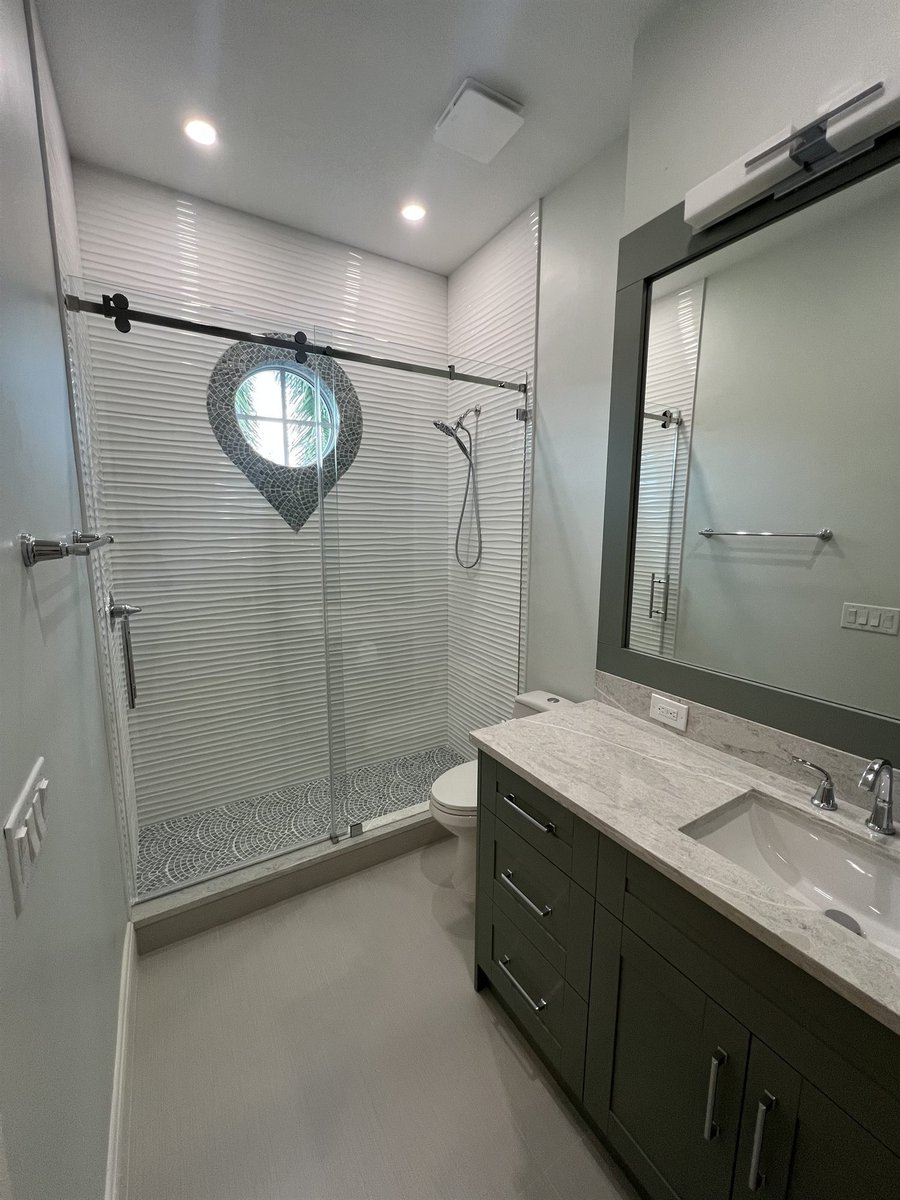 sliding glass shower with teardrop window and gray vanity bathroom remodel - optimized
