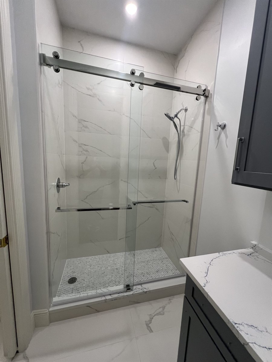 sliding glass shower with white marble tile bathroom remodel - optimized