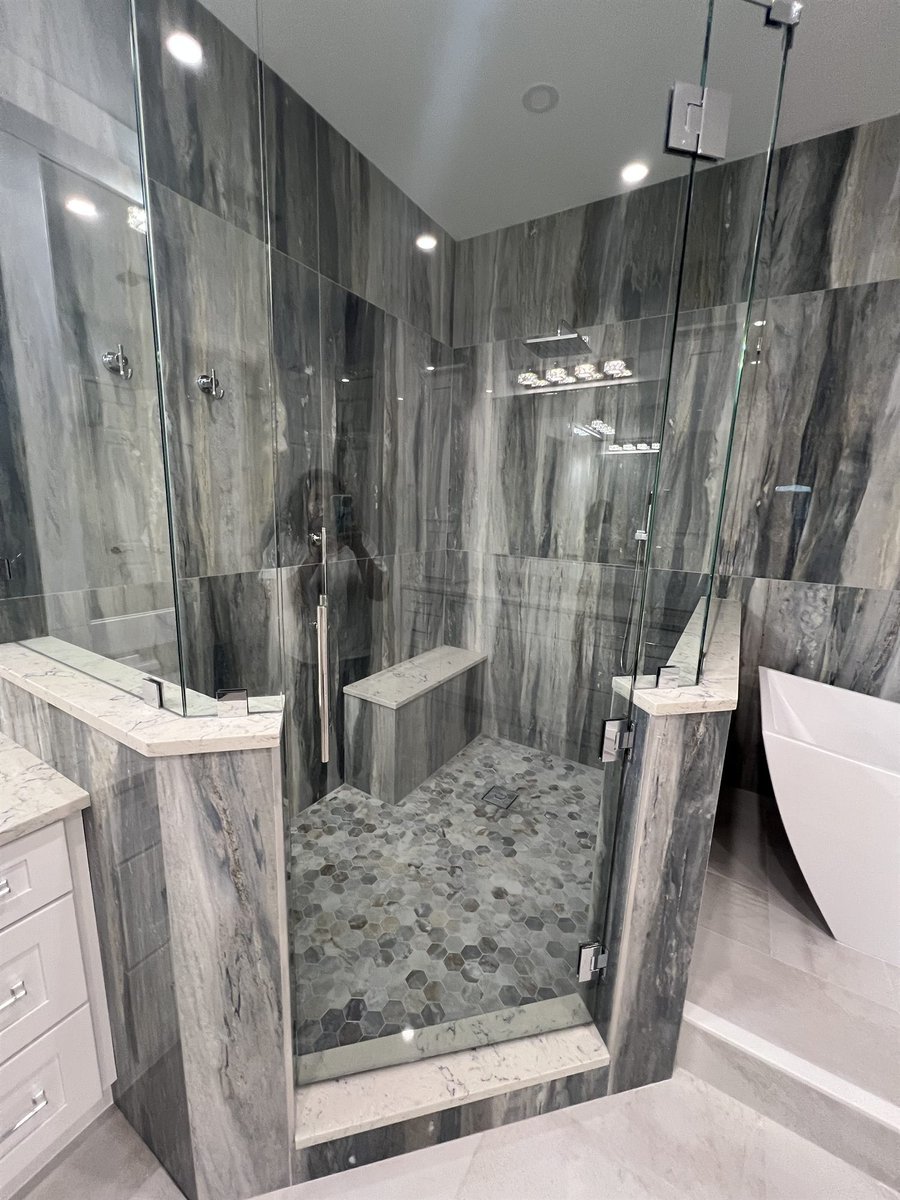 walk-in shower with marble tile and freestanding tub bathroom remodel - optimized