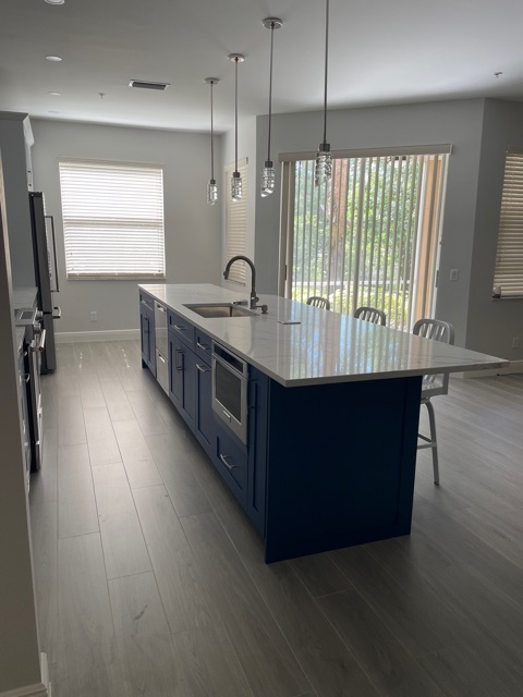 kitchen and bathroom remodel blue island with quartz counter and sliding door view in naples fl