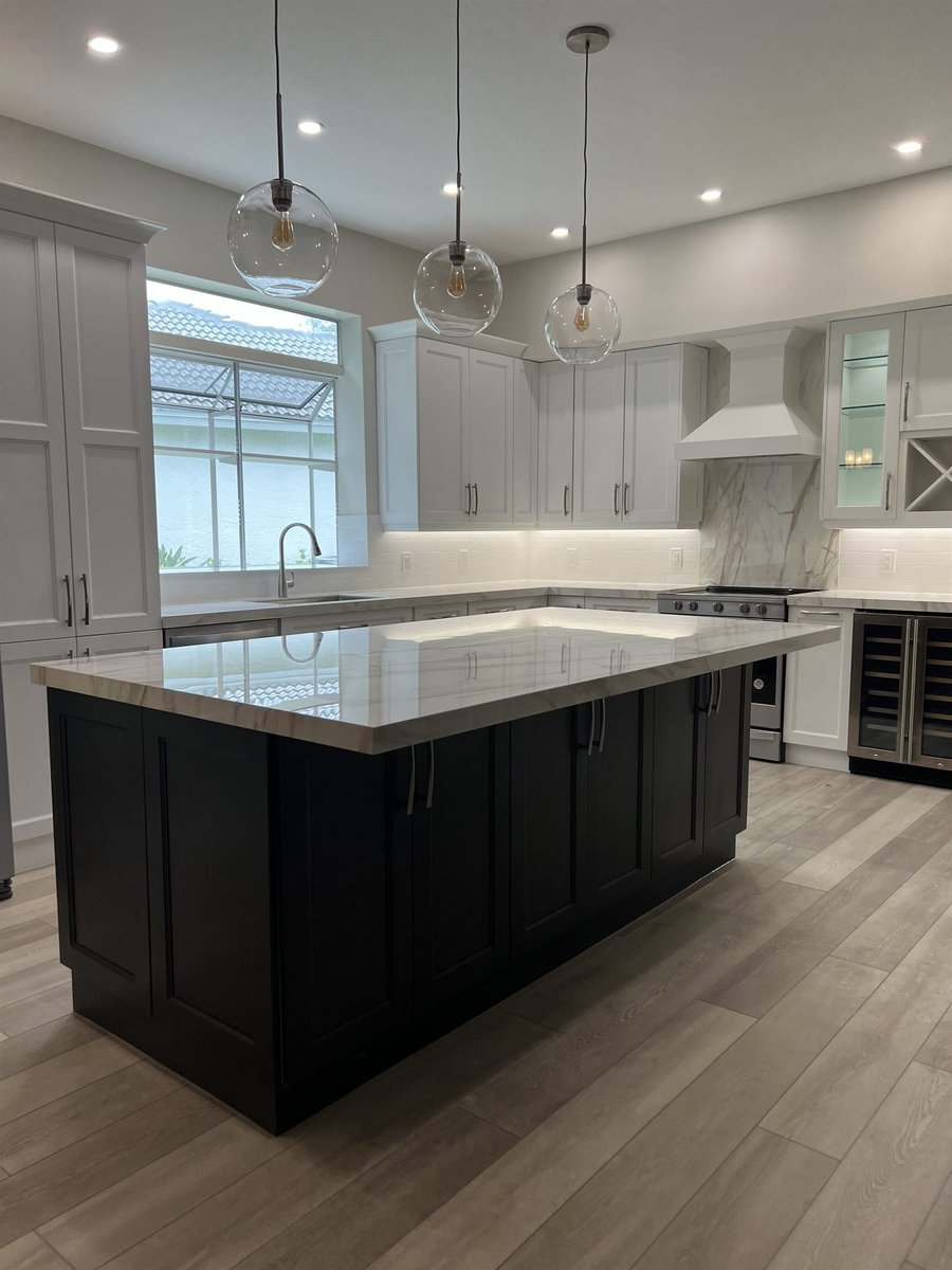 dark island white cabinets glass globe pendants marble backsplash kitchen remodel - optimized 2
