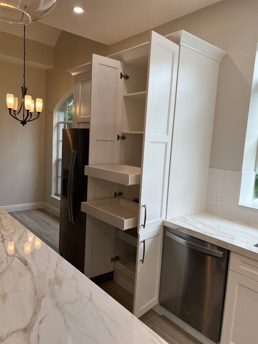 white pantry cabinets with pull-out shelves and stainless dishwasher kitchen remodel - optimized