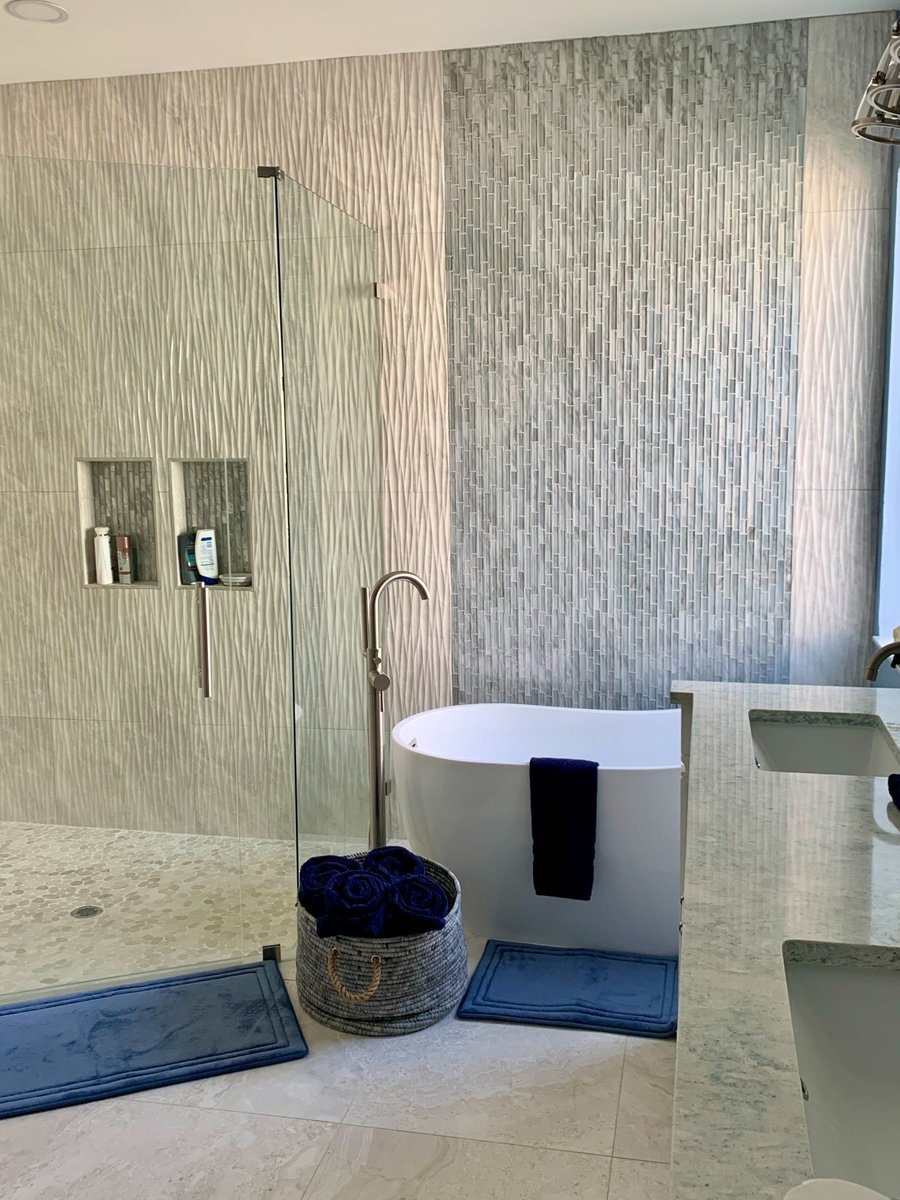 glass enclosed shower and freestanding tub in naples fl bathroom and kitchen remodel