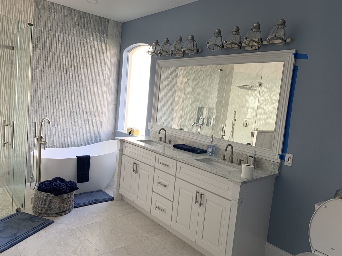 white double vanity with freestanding tub and glass shower bathroom remodel - optimized