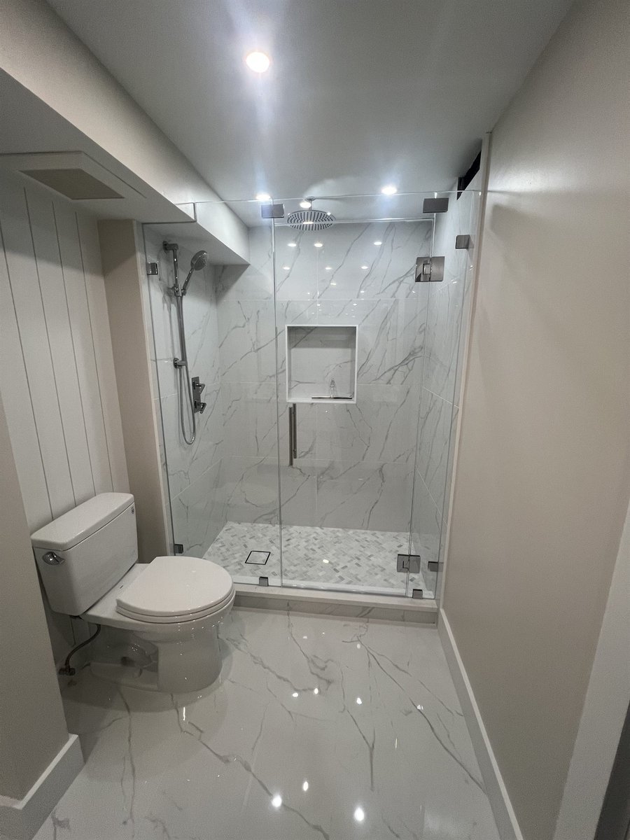 marble tile walk-in shower and toilet bathroom renovation