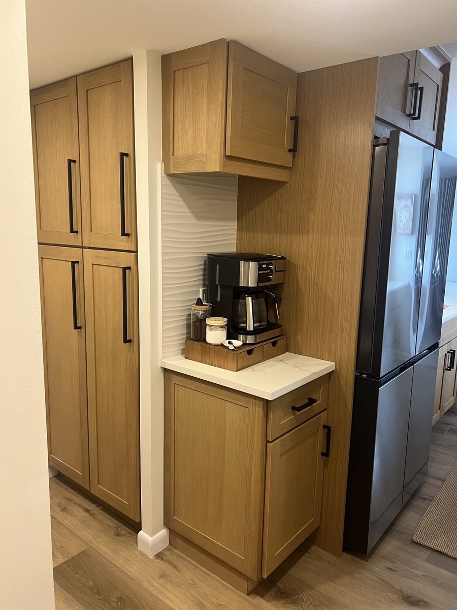 wood shaker pantry cabinets with coffee station and black french door refrigerator kitchen remodel